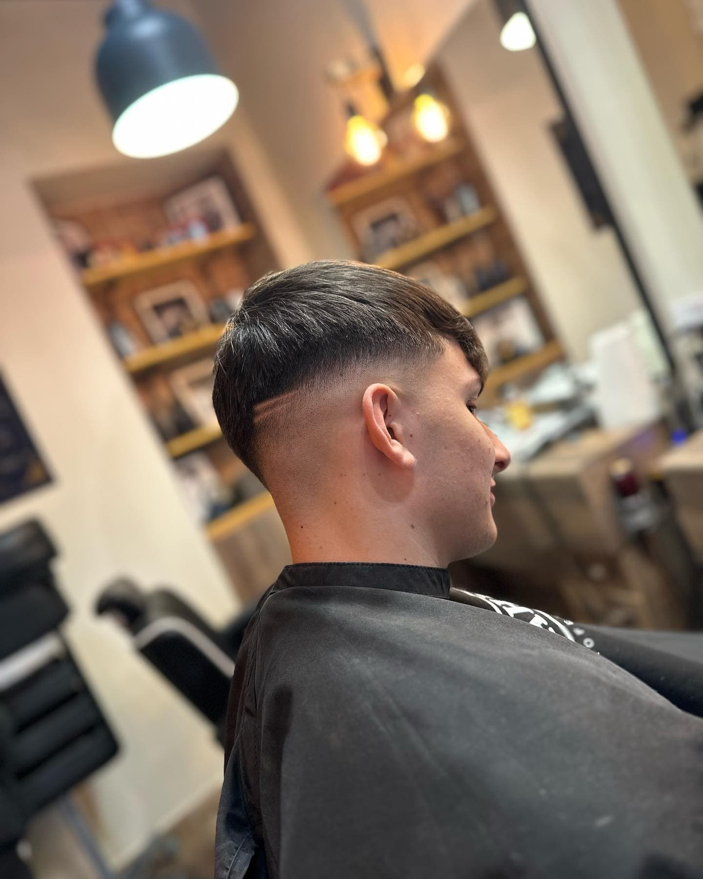 A finished textured crop and taper, seen from behind